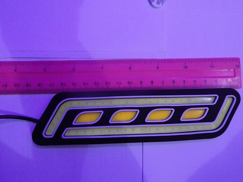 Светодиодные LED дневные ходовые огни в силиконовом корпусе 12В (производство LED, Китай)+поворот 00518 фото